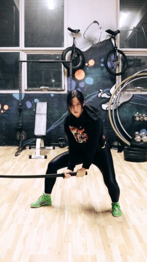 Emily Tung Instagram - Weapon of the day ⚔️ 
🎥 @kayzilla 
.
.
.
.
#samurai #samuraigirl #swordplay #samuraisword #wushu #kungfu #martialarts #martialartist #wushugirl #fightgirl #stunts #stuntwoman #stuntman #stunttraining #actionactor #stuntdouble #fightchoreography  #shaolinkungfu #mma #femalefighter #femalemartialartist #chunli #gym #stuntlife #sword #katana #stuntpoc #stuntlisting #muhammadali #superman