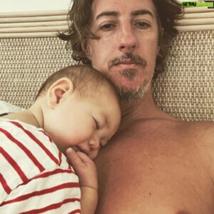 Eric Balfour Instagram - I took this shot last December in the house we rented on Maui. We all had crazy Covid and were in so much pain. It was our first trip to Hawaii since the pandemic. This island has the most special place in my heart and being sick the entire trip sucked beyond on belief. As sick as we were we took Oli to see the giant banyan tree in Lahaina the day before we left. The banyan is gone now along with so many business and homes. Hawaii's locals depend so much on the tourism places like Lahaina generate and our brothers and sisters there will need our help to rebuild from these devastating wildfires. You can donate to the link in my bio. Mahalo!