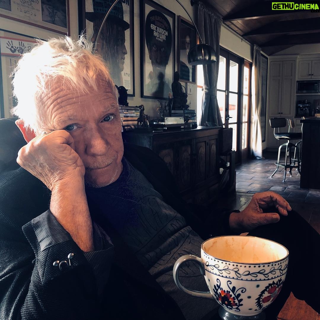 Eric Burdon - 870 Likes - After the rain, fireside with a good cup of coffee and morning conversation. She caught me on camera in the comfort of our home!! Behind me the sun calls me to take my morning walk. I will! Under protest...