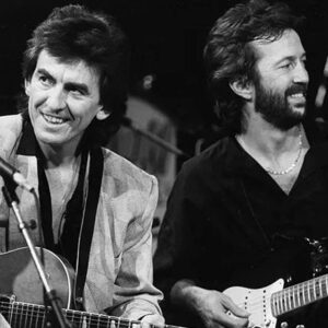 Eric Clapton Instagram - Eric Clapton photographed performing with George Harrison in 1985.

📸: Dave Hogan/Getty Images