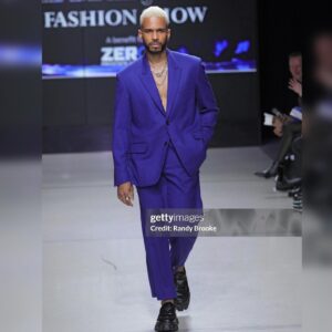 Eric West Instagram - Affairs of the heart…. Thank you to @bluejacketfashionshow for having me be part of this amazing cause once again. #BlueJacketFashionShow

Outfit: @teddyvonranson 
All jewelry: @titleofwork 
Shoes: @prada 

Hair: @deiby.barber26 / @enriques_barbershop_salon 
Grooming: @nadiamezabeauty @monique_marquerite 

Quick thanks to the entire time for getting me in this outfit a few minutes before the runway and holding me down backstage! 💙❤️‍🔥