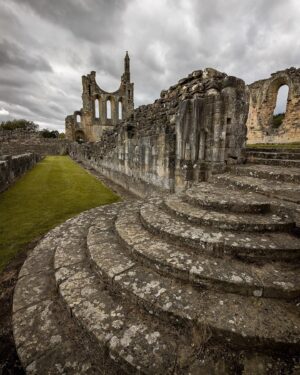 Evelyn Edwards Instagram - Byland Abbey is such a gem. Is it gigantic like Rieveaulx or Fountains Abbey? No. But it’s still so lovely and special. In its day, Byland Abbey was considered to be one of the finest churches in 12th in the whole of Europe.  One fabulous fun fact - Byland Abbey had a manuscript collection, one one of them was a manuscripts was a collection of twelve ghost stories! Medieval ghost stories! They are now in the British library. .⁣
.⁣
.⁣
.⁣
.⁣ #medieval #medievalarchitecture #churcharchitecture #abbey #history #yorkshire #medievalhistory #medievaltimes