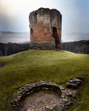 Evelyn Edwards Instagram - As a girl who grew up in Las Vegas, it is always amazing to me you be near a structure that is almost 900 years old. It’s even more fun for me to imagine all the people and activities that happened there. This tower is the Keep of Skenfrith Castle. Dirt would have been piled up around this round tower and there would have been a wooded staircase outside of the building. The basement would only have been accessed through a trap door.  You might notice the larger window holes at the top. This is where the lord would have lived, on the second floor. The chambers would have had a fireplace and it’s own private latrine. FANCY! 🏴󠁧󠁢󠁷󠁬󠁳󠁿 🏰 .
.
.
.
.
.
.
#cymru #wales #visitwales #discovercymru #discoverwales #northwales #southwales #welsh #snowdonia #cymraeg #medieval #igerswales
 #aband0n_all_h0pe #grime_lords #glitz_n_grime #forgotten #ig_abandoned #urbanexploring #ig_captures_decay #ig_urbex #beautyindecay #urbex_supreme #urbex_utopia #urbexworld #urbexphotography #grime_nation #abandonedbuilding #kings_abandoned #the_relics #abandoned_junkies