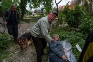 Evgeniy Maloletka Instagram - VOVCHANSK, Ukraine

Ukrainian officials haven’t officially confirmed whether Russian had taken the villages, which lie in a contested “gray zone” on the border of Ukraine’s Kharkiv region and Russia.

The renewed assault on the region has forced more than 1,700 civilians residing in settlements near the fighting to flee, according to Ukrainian authorities. It comes after Russia stepped up attacks in March targeting energy infrastructure and settlements, which analysts predicted were a concerted effort by Moscow to shape conditions for an offensive.

Today us accompanied an evacuation team described empty streets with multiple buildings destroyed and others on fire. The road was littered with newly made craters and the city was covered in dust and shrapnel with the smell of gunpowder heavy in the air. Mushroom clouds of smoke rose across the skyline as Russian jets conducted multiple airstrikes.

“In the current moment, the situation in Vovchansk and the settlements along the border (with Russia) is incredibly difficult. Constant aviation strikes are carried out, multiple rocket missile systems strikes, artillery strikes,” said Tamaz Hambarashvili, the head of Vovchansk City Military Administration.
“For the second day in a row, we evacuate all the inhabitants of our community who are willing to evacuate.”
“I think that they are destroying the city to make (local) people leave, to make sure there are no militaries, nobody. To create a ‘gray zone,’” Hambarashvili said.

Evacuees bade tearful goodbyes to their neighbors as they were taken away from their homes.

“You lie down and think — whether they will kill you now, or in an hour, or in three,” said resident Valentyna Hrevnova, 75. “I hope that they (Russians) will not come, but ours (Ukrainians) will be here.”
Vera Rudko, 72, was among those who left.

“We drove through Vovchansk in the city center,” Rudko said. “I can’t look at this without tears. Everything is trembling. We didn’t sleep these two nights at all.”

#ukraine #russia #war #invasion