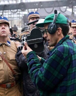 Finn Wittrock Instagram - In 1936, a German man, presumably identified as August Landmesser, was photographed refusing to perform a Nazi salute and crossing his arms in defiance.

Swipe to see behind-the-scenes photos of how this shot was recreated in #AvaDuVernay’s ORIGIN.

#ORIGINMovie is now playing in theaters. Get tickets at originfilm.com via the link in bio.