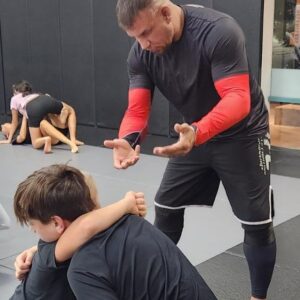 Frank Mir Instagram - As a competitor, you learn about yourself as a teacher you learn about your art. Priceless moments teaching one of my students Cash and my son.