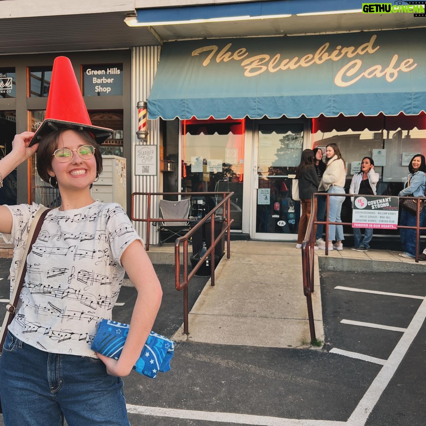 Gabriella Graves - 379 Likes - Got to visit the iconic Bluebird Cafe in Nashville last weekend! I dream of someday playing at this amazing venue 🐦🎶
.
The third slide is a dare I was given by the security guard to wear the musical cone hat 🤪