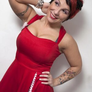 Genevieve Goulet Instagram - I added this dress to the LuFi-Auctions section on www.lufisto.com to raise money for my surgeries.

It's not related to wrestling or isn't a collector's item, but it's something I did wear for a photoshoot a few years ago. Besides for the shoot and a wedding, this dress was never used again.

It is an official Las Vegas Betty Page Store Pin-Up Dress, Elvgren by Tatyana brand, size Small.

It was paid $225.00 USD back then and just like everything else, I'm taking offers.

Make sense? We add shipping and it's yours!

Thank you! ❤️

LuFisto