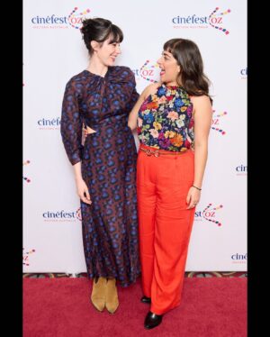 Geraldine Hakewill Instagram - My beautiful work wife (producing partner) on @theroosterfilm @mahveenjoon ❤️ 📸 @mac1photo 

ID: two dark haired women stand on a red carpet against a back drop that reads “CinéFestOz”. The have their arms around each other and they are looking at each other, smiling.