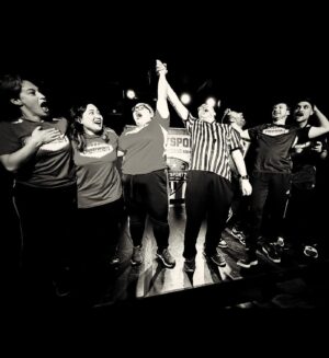 Giovannie Espiritu Instagram - Made my debut as a Comedy Sportz Pro Player with the Red Rocks Team tonight. It was a neck-and-neck game, but we pulled through 26-25 against the formidable Blue Diamonds. 🏆🥇🏆

Grateful to have a space where failing hard is funny, big swings are encouraged, and my goofy goober gets more reps. 😂🙌 Every player was beyond talented, extremely fast and witty (🙇🏻‍♀️) and I’m thankful to be included the shenanigans. 

Super props to our Captain @heatherdragulescu and teammate @unkimportant who were seasoned players willing to have this rookie on their team. 🌄

Good game y’all. 🫶🏽
📸: by @bobbydragulescu & Luis
#ComedySportz #DebutGame #RedRocksTeam #ImprovComedy #Thankful #Community #LaughterIsTheBestMedicine #gotyourback #createmoremomentsofjoy #goodgameandgiving
