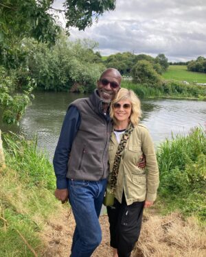 Glynis Barber Instagram - In the wilds of Stratford Upon Avon. 
Literally 2 minutes from the city centre, walking along the Avon and in countryside. 
Here with our dear friend Ewart who’s in a fabulous and unique production of As You Like It at the @thersc. 
The cast are all on the mature side ((65 ) and the production is very relaxed, actors chatting with the audience and the vibe is chilled. Great fun. 
#shakespeare #theatre