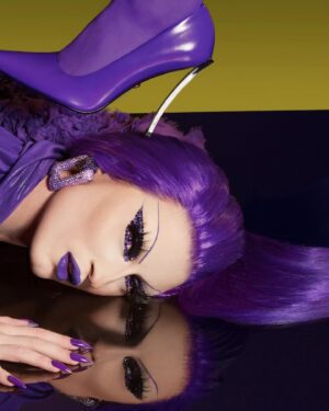 Gottmik Instagram - 💜MONOCHROMATICA💜  @versace SS 2023 was this first Versace show I attended right after doing my first campaign with the house. I remember being so excited and wanting to wear it ALL so coming full circle and being able to wear these iconic pieces together on the main stage of @rupaulsdragrace was insanity 💜 thank you to the entire @versace team for making this happen I love you forever 💜
Makeup inspired by @patmcgrathreal for the Versace FW 23 show 
Hair by @jeanbaptiste.santens 
Photo by @sanchezzalba
Look by @versace @donatella_versace