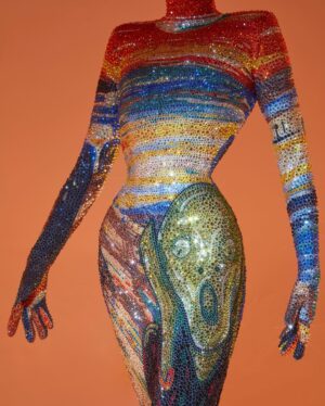 Gottmik Instagram - The scream by Edvard Munch 1893 
.
Over 500,000 crystals in 50 different colors and over 1000 hours to complete.
This dress was a labor of love and another very iconic moment for me. @thediscodaddy is the only artist I have ever met that would be able to do create this level of artistry and I am so honored to have been able to wear this piece of art on the @rupaulsdragrace stage! ✨🖼️

Photo by @sanchezzalba 
Dress construction by @marcosquared