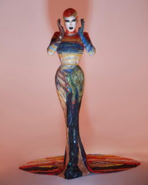 Gottmik Instagram - The scream by Edvard Munch 1893 
.
Over 500,000 crystals in 50 different colors and over 1000 hours to complete.
This dress was a labor of love and another very iconic moment for me. @thediscodaddy is the only artist I have ever met that would be able to do create this level of artistry and I am so honored to have been able to wear this piece of art on the @rupaulsdragrace stage! ✨🖼️

Photo by @sanchezzalba 
Dress construction by @marcosquared