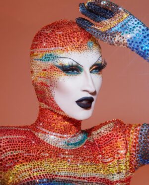 Gottmik Instagram - The scream by Edvard Munch 1893 
.
Over 500,000 crystals in 50 different colors and over 1000 hours to complete.
This dress was a labor of love and another very iconic moment for me. @thediscodaddy is the only artist I have ever met that would be able to do create this level of artistry and I am so honored to have been able to wear this piece of art on the @rupaulsdragrace stage! ✨🖼️

Photo by @sanchezzalba 
Dress construction by @marcosquared