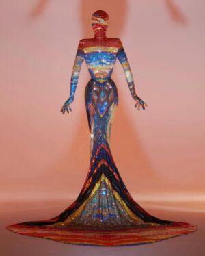 Gottmik Instagram - The scream by Edvard Munch 1893 
.
Over 500,000 crystals in 50 different colors and over 1000 hours to complete.
This dress was a labor of love and another very iconic moment for me. @thediscodaddy is the only artist I have ever met that would be able to do create this level of artistry and I am so honored to have been able to wear this piece of art on the @rupaulsdragrace stage! ✨🖼️

Photo by @sanchezzalba 
Dress construction by @marcosquared