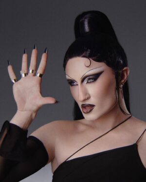 Gottmik Instagram - No falsies no problem!⛓️🔥🖤
My first-ever beauty campaign for KVD’s new Full-Sleeve Tubing Mascara and Tattoo Pencil Liner. I’m wearing the shades Chromite Black, Pearls par White, and Trooper Black. Available now at @sephora !
I started doing drag to push boundaries and it was such a punk rock form of art. I think that really transferred over to the way I look at beauty—I love always pushing limits and pushing my creativity to the fullest, which is what KVD is all about.
I'm so honored to be a part of this campaign and I hope you love this mascara as much as I do! It’s truly a Full-circle moment with @kvdbeauty, a brand I’ve loved for years as a goth diva 🖤
Makeup Artistry: me & @alliesmithmakeup Photographer & Director: @christian_ferretti Hair: @edwardlampley c/o CLM
Styling: @markpaul_
Set Design: @twohawksyoung
Makeup Assistants: @zacmakeupartist @ionamouramakeup 1st Photo Assistant: @markgrgurich
2nd Photo Assistant: @davideristavi
Digital Tech: @digikenseth
Styling Assistant: @in_d_yuh
Hair by @edwardsizzahands2.0 
Hair Assistants: @katarlina_ @thestylist.Jamie
Manicurist: @honeynailz

Creative Director: @paultrapani, @helloangelica Producers: @cmeshesh @jea_nelly

#KVDxGottmik #FullSleeveMascara #TattooPencilLiner #KVDFace