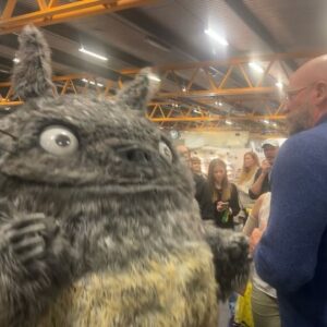 Graham McTavish Instagram - You never know who you’ll meet at a convention. Today in Stockholm I met one of my heroes. Here’s me trying to get my arm around Totoro. What an outfit! Took a year to make!!! #totoro #cosplaytriumph @scifiworld