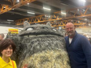 Graham McTavish Instagram - You never know who you’ll meet at a convention. Today in Stockholm I met one of my heroes. Here’s me trying to get my arm around Totoro. What an outfit! Took a year to make!!! #totoro #cosplaytriumph @scifiworld