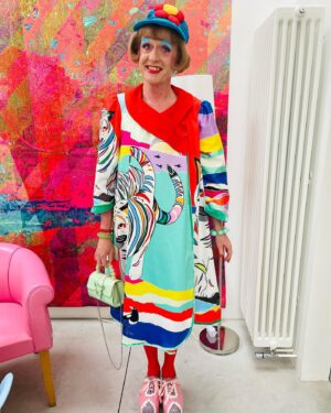 Grayson Perry Instagram - Off out last night to a do for the brilliant @ATTheBusUK 
Dress and hat by CSM student who forgot to put in a label
Bag Sophia Webster