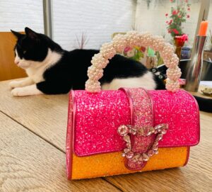 Grayson Perry Instagram - Put together my look round my new sparkly Sophia Webster bag, dress by Chao Li @UAL student
