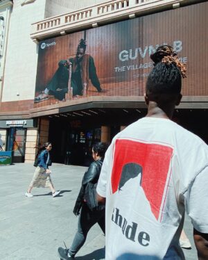 Guvna B Instagram - Proud to give you my new album, The Village Is On Fire. It’s an album full of battles and blessings and I hope you get something from it. Buy and stream it like there’s no tomorrow. Love 🏚️ 

Thanks to @spotify @spotifyuk for putting my big head up in Leicester Square 🖤

Produced by TSB, SAMPAH, 
JimmyJames, Gavin Powell

Mixed by Dan Parry 
Mastered by Jacob Biz Morris, Get MXD