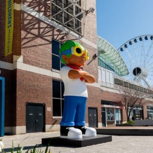 Hebru Brantley Instagram - New statue 🚨! Flyboy has a permanent home at @navypierchicago When I first started my career as a visual artist I dreamt of having a public sculpture in my home town. This weekend that dream came true. All smiles as history is made. Thank you to everyone That has helped through their support their love or their hard work to make this a reality. I wouldn’t have made it to this point without you. Special thx to the Wong family We just getting started!  #chicago #navypier #navypierchicago #grateful #nevermorepark #flyboy @hidden_s_rank