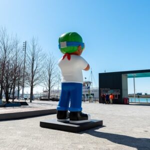 Hebru Brantley Instagram - New statue 🚨! Flyboy has a permanent home at @navypierchicago When I first started my career as a visual artist I dreamt of having a public sculpture in my home town. This weekend that dream came true. All smiles as history is made. Thank you to everyone That has helped through their support their love or their hard work to make this a reality. I wouldn’t have made it to this point without you. Special thx to the Wong family We just getting started!  #chicago #navypier #navypierchicago #grateful #nevermorepark #flyboy @hidden_s_rank