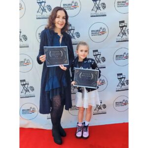 Hélène Cardona Instagram - I'm over the moon to have won the Best Actress Award for @caraliquefilm! 🌟 Huge thanks to @idyllwildcinemafest 💖 Boundless thanks to @officialstephensavage @im3trinity and everyone at the Idyllwild International Festival of Cinema and to @kai_fischer_tip_top for the pic 💞💐 🎥

In this #motherdaughterstory I star as Arlette Linstrom, who is an ode to mothers & all they sacrifice. Arlette does everything in her power to help her daughter Caralique succeed in fashion and have a better life ⭐ I dedicate this award to my mother Kitty, who believed in me before anyone else and stood by me. I miss her so much. 

Congratulations to @copilotkali who won the Best Child Actor Award for her role as Young Caralique. It was such a treat playing with you!

Much gratitude to the whole cast and crew. It was a pleasure working with you.

#gratitudeattitude
#celebratelife
#filmfestival 
#staypositive
#actorslife #followyourbliss
#ilovemyjob #storytellers #festivalseason
 #Internationalactress
#multilingualactor 
#festivalnews
#helenecardonamagic 
#helenecardona