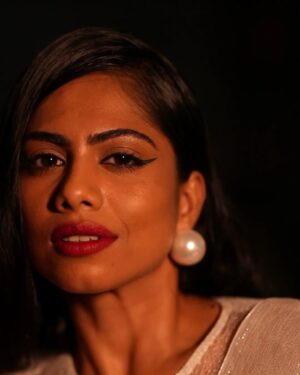 Henna Bella Instagram - @hennabella_4 as the November Bride.

Wearing a Silk Georgette saree with silver zari and a lace high-neck blouse from @saltstudio 

Paired with over-sized pearl earrings from @dhora_india and a silver finger ring with red stones from @amrapalijewels Both these pieces of jewellery are available at the @saltstudio Kochi store.

I would recommend this Indian Christian bridal look for an evening wedding. The shimmery saree would work brilliantly for night-time photography. The pallu can be draped over the head and doesn't require an additional veil. The saree itself is lightweight and offers an ease of wear that heavily embroidered sarees and kanchipurams don't.

Outfit: @saltstudio 
Photography: @___.r_e_d.___ assisted by @the.najose 
Concept, Creative Direction and HMU: @priyamaudlin
Assisted on Hair by @enchantbyeapen 

#nighttimephotography
#bridalportraits
#bridalmakeupkochi #bridalmakeupkerala #keralachristianbride #keralamakeupartist #kochimakeupartist #flashphotography