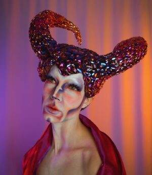 HercuSleaze Instagram - I’m entering a new era of my drag 💜For a year after the tv show aired I was able to pay my bills by performing & teaching drag, and with the occasional sponsored post. I felt lucky to be able to turn my passion into a career but the increased attention that came with it made my anxiety skyrocket! I felt tied to the treadmill of maximizing the exposure I’d received and it stripped away a lot of my love for the artform. This year I’ve been processing that pressure and those high expectations, and I’ve been taking space back in my life for Meags. I’m finally at a place now where I’m at peace about doing just what I can and only what feels good. My goal is to make looks that interest me and to perform acts that make my friends laugh. If I can still book the occasional well paying gig here and there, I’ll be grateful for those opportunities! 💜 Hooray for improved mental health!

😈 Headpiece by me
📸 Photography by me

#dragking #dragkings #dragartist #canadiandragking #canadiandrag #dragphotography  #dragqueen #malecontour #dragkingmakeup #femmeking #montrealdrag #dragmtl #canadiandragking #canadiandrag #instadrag #dragphotography #androgynous #genderbender #performanceart  #queerart  #dragkingsofinstagram #dragkingvisibility #alldragisvalid #canadianmua