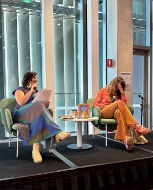Holly Ringland Instagram - My final event at @sydwritersfest this year stole my heart - I was honoured to do an event on Dharug Country at @phive.ps with a sold out crowd in the company of incomparable human, author, woman @katemildenhall.

In our conversation about The House That Joy Built - which Kate so beautifully, thoughtfully and skilfully curated - we laughed, cried, unearthed glimmers and to my own surprise I shared a story I’d never told publicly before. Such was the power of Kate, and our Parramatta crowd. Kate, thank YOU for giving your time and energy so generously - I’m so thankful that this writing life brought us together too. Thank you so much to everyone who joined us on the day including festival volunteers and booksellers, and Councillor Patricia Prociv. Special thanks to everyone I met in the signing line - you shared profound gifts with me, and my gratitude for your time, readership and support is evergreen. Final thanks also to @rackcityvintage @rollasjeans @fluevog for the 70s newsreader/disco combo that didn’t know I’ve always needed.

❤️‍🔥 🪩 ❤️

Repost • @kmildenhall
Honestly, getting to hang with this woman, on stage and off, is one of the great delights of this writing life. A JOY, as always dear @hollygoeslightly to speak with you out in Parramatta at @phive.ps for readers & writers & creatives of all stripes. 

Thank you, as always Holly, for laughs, for making me cry, and for your generous stories and insights which make others feel like they, too, can make the stuff, come out of the fire, share what makes their heart bust. 

Dear @sydwritersfest you’ve been such a delight xxx Thank you for having me (and thank you dear @catherineishome & Lil for all the things xx) 

#sydneywritersfestival #writingcommunity #thehousethatjoybuilt #writersfestival