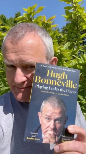 Hugh Bonneville Instagram - Look what’s just arrived. The new incredibly portable paperback edition of my memoir #PlayingUnderThePiano will be out next week in the UK and 8th August in the US. You simply must order your copy here: 
geni.us/PlayingUnderThePianoPB

(Link in bio)