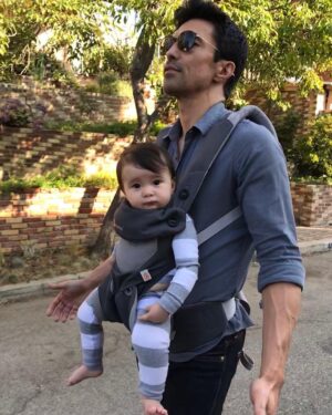 Ian Anthony Dale Instagram - Not long from now, he’ll be walking beside me, and I will miss the days when his momma and I did all the walking for him. #theygrowupsofast