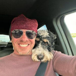 Ian Ziering Instagram - Hello, my InstaFam ❤️ 
2023 is a upon us and there’s no looking back. I am super charged with excitement, and I await with eager anticipation for what this year will bring. And more importantly, what I can do to help others up along the way. This is my ride or die buddy, Rocket he’s the most incredible dog in the world. He takes K9 up to K10. If he had arms, he would hug me to death, but because he doesn’t he clinches me with neckhugs, or leans into me with all his might. I wish you all love, laughter, and happiness, and may this be the best year yet for us all!