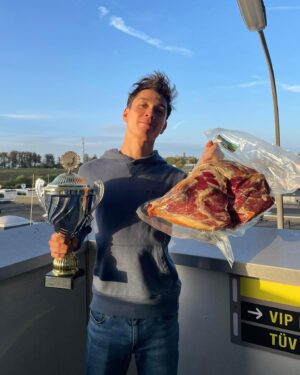 Jack Aitken Instagram - First race at ‘The Green Hell’. Walking away with a class win, a surprisingly heavy bag of meat, and very wide eyes! 

Getting your Permit for the infamous Nordschleife circuit isn’t a simple one, for good reason. You need to take a series of theory and practical courses, before accumulating 18 race laps in the lower powered classes, like the one I raced here, snappily named VF2-FWD. There are an absolute litany of classes here (see my meme), but ours is basically a stripped-out road car with slicks. This means it’s actually harder to drive than a full blown GT3 racer, lift-off oversteer is real. 😅

I was lucky to be with people who know what they’re doing, @walkenhorstmotorsport, and my teammates @baileyvoisin and @manuel_maldonado33. I did the first half of our 4hr race, and my gosh the things I saw… 😂 As well as epic slipstream battles on the 2.5km Döttinger straight, I drove with my eyes in the mirror as faster cars sailed past at impossible speeds for my poor little Hyundai, drove past flatbed trucks on their way to recover cars that had crashed somewhere on this mammoth 21km ‘track’ and scared myself silly a few times when the already-close barriers starting inching closer… 

I somehow (genuinely, no idea how) got us from P4 in class to the lead at the halfway mark. My teammates finished it off to take a win on my first attempt at the Nordschleife! I should really walk away now with the 100% record 😂 

I’ll be back next year to get my remaining laps, for now though attention goes back to our regular schedule with Petit Le Mans next week…
