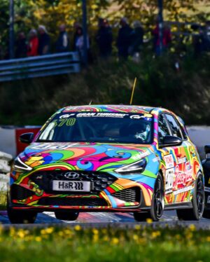 Jack Aitken Instagram - First race at ‘The Green Hell’. Walking away with a class win, a surprisingly heavy bag of meat, and very wide eyes! 

Getting your Permit for the infamous Nordschleife circuit isn’t a simple one, for good reason. You need to take a series of theory and practical courses, before accumulating 18 race laps in the lower powered classes, like the one I raced here, snappily named VF2-FWD. There are an absolute litany of classes here (see my meme), but ours is basically a stripped-out road car with slicks. This means it’s actually harder to drive than a full blown GT3 racer, lift-off oversteer is real. 😅

I was lucky to be with people who know what they’re doing, @walkenhorstmotorsport, and my teammates @baileyvoisin and @manuel_maldonado33. I did the first half of our 4hr race, and my gosh the things I saw… 😂 As well as epic slipstream battles on the 2.5km Döttinger straight, I drove with my eyes in the mirror as faster cars sailed past at impossible speeds for my poor little Hyundai, drove past flatbed trucks on their way to recover cars that had crashed somewhere on this mammoth 21km ‘track’ and scared myself silly a few times when the already-close barriers starting inching closer… 

I somehow (genuinely, no idea how) got us from P4 in class to the lead at the halfway mark. My teammates finished it off to take a win on my first attempt at the Nordschleife! I should really walk away now with the 100% record 😂 

I’ll be back next year to get my remaining laps, for now though attention goes back to our regular schedule with Petit Le Mans next week…