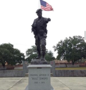 Jack Carr Instagram - Special Operations legend Arthur D. “Bull” Simons was born on this day in 1918. His service spanned World War II through Vietnam to include the Raid at Cabanatuan in the Philippines and the Son Tay Raid in North Vietnam. In 1979 he was hired by Ross Perot to plan and lead a mission to rescue two Electronic Data Systems employees arrested in the Iranian Revolution and imprisoned in Iran. That rescue mission is detailed in the book ON WINGS OF EAGLES by Ken Follett.
•
I was able to spend time with Mr. Perot on two occasions, talk about the mission in Iran and see artifacts from Son Tay. Some of those pictures are included in this post.
•
Colonel Simons’ legacy is honored with a statue at the JFK Special Warfare Museum facing the John F. Kennedy Special Warfare Center and School, Fort Bragg, North Carolina. On one side of its base are the words: 
“HISTORY TEACHES THAT WHEN YOU BECOME INDIFFERENT AND LOSE THE WILL TO FIGHT SOMEONE WHO HAS THE WILL TO FIGHT WILL TAKE OVER.”
-COLONEL “BULL” SIMONS / SON TAY RAID / NOVEMBER 21, 1970.
On the other side are the words: 
WHO WILL GO? “SEND ME.”
•
His headstone in Barrancas National Cemetery, Section 36, Site 1956 reads: 
ARTHUR
DAVID
SIMONS
COL
US ARMY
WORLD WAR II
KOREA
VIETNAM
JUN 28 1918
MAY 21 1979
•
#BullSimons #USArmy #SpecialForces #SpecialOperations #Legend