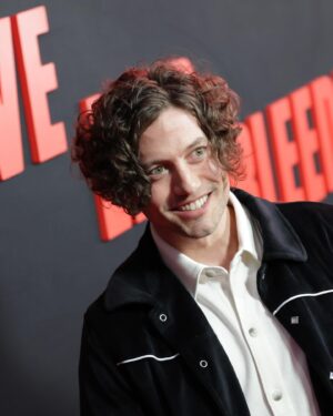 Jackson Rathbone Instagram - Thanks @a24 for the invitation to the premier of #LoveLiesBleeding last night!  Wonderful to catch up with old friends and make some new ones.  Plus .. an AMAZING film.

Love Lies Bleeding is destined to be a cult classic. 
With a feeling of early Cohen Bros and a bit of David Lynch, this film leapfrogs modern traditional thrillers, with a decent dose of absurdity, which highlights reality as opposed to distancing.  The acting is perfect .. love Kristen Stewart (duh), Katy O’Brian is phenomenal, and the scene stealing turn from Anna Baryshnikov !! Plus Ed Harris is 👌

The script is tight, brimming with suspense, and well placed laughs.  The music is perfect, Clint Mansell is a CHOICE.  The cinematography is exquisite.  Overall, Rose Glass has slayed this incredible film with a vision that’s unique and compelling, and destined to be around for a long time.  @a24 does it again.  Thankful for FILM !! 🙏🙏🙏