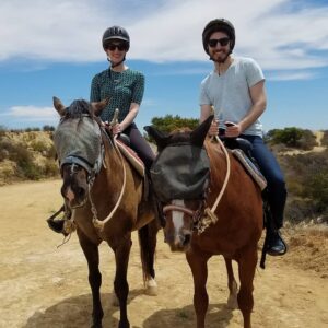 James A. Janisse Instagram - Yesterday for @carebecc's birthday we didn't work at all (unheard of for us) and instead: Rode horses, did a puzzle, and watched an entire season of Great British Bake Off. Happy (yesterday) birthday to her, my special little snugglesaurus ♥️
