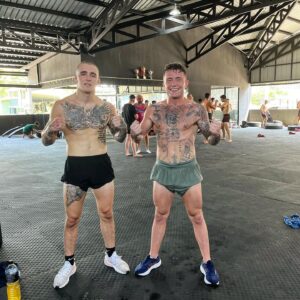 James Gallagher Instagram - Monday morning graft in @strikingcoach_cmcb boxing class with @maximuslally 💚🇮🇪👑