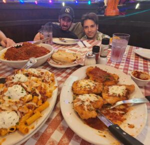 James Willems Instagram - Well, we've marked another novelty restaurant off our "Eat at every novelty restaurant at Universal City Walk" list and can confirm that when you're a Buca di Beppo you're family (style). Did we have to order every entree as a large? No. Did we have to request the "romance room" after already having been seated at another table? No. Did we have to speak in thick mafioso accents? Absolutely not. But we did. And it was a night we'll never forget, because of it.

City Walk Dining Checklist 
- Toothsome Chocolate Emporium ✅ 
- Margaritaville ✅ 
- Bubba Gump Shrimp ✅ 
- Bucca di Beppo ✅