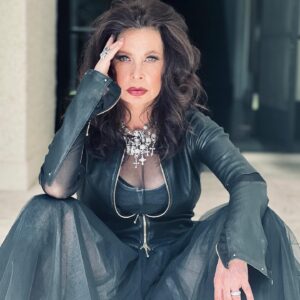 Jane Badler Instagram - Feeling the power .. Born in the 50’s growing up in the 60’s. Women were still fighting to find a place of empowerment in society . My own mother used her vast intelligence to further my father’s ambitions. I too struggled with claiming my voice . So important for us all to educate ourselves on not just our own interests but on money and finances. Never too late . Next week im starting a crypto currency course.. keep you posted on my financial education!! photo by @djnarelle makeup @celestej_makeup. clothes my own !