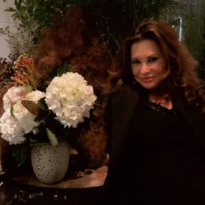 Jane Badler Instagram - Happy Holidays everyone… today is my 33rd anniversary. I feel astonished and blessed to have made it through the trials and tribulations of life with this special man by my side.. Thank you @strownix for creating so much beauty in my home.. Merry Christmas everyone so grateful for your love ❤️