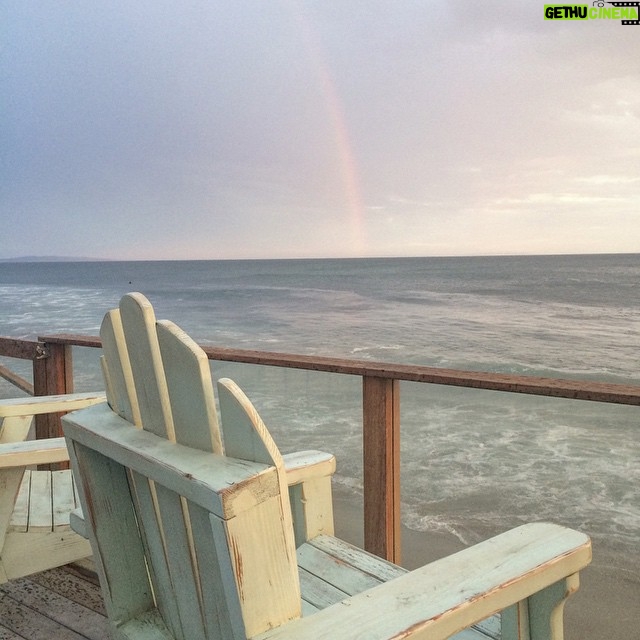 Jane Leeves - 493 Likes - Sitting on our deck last night in the rain. This rainbow looks like it's emerging out of the ocean.