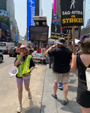 Janie Haddad Tompkins Instagram - 1) @realmichellehurd who says, “We’re on the right side of history!” Thank you, Michelle for the pic and the strong words! 2) me and Todd proving the @wgaeast & @sagaftra solidarity! 3) with signs 4) making some noise for THE SUITS 5) obsessed with this NYC strike captain, I love her energy and leadership

#WGAstrong #DoTheWriteThing #WGAstrike
#SagAftraMember #1u 
#SAGAFTRAstrong #SAGAFTRAstrike #Power2Performers