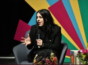 Janina Ramirez Instagram - So chuffed with this photo taken of me @wimbookfest today! I usually look maniacal while mid-rant, but here I look earnest and mild-mannered. A rare moment indeed!