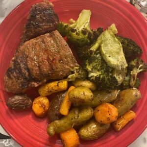 Jason Priestley Instagram - Day 300? Of captivity... found these two #waygu New York Steaks in the freezer... carrots and fingerling potatoes on one sheet pan- broccoli on the other... make a fire... grill steaks... @naydoggy cut one in half at the pass so the final plating was kind of ugly... I’m out of practice...