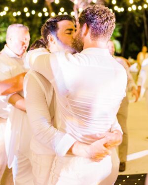 Jaymes Vaughan Instagram - Two years ago today I got to marry my best friend. For as long as I can remember I used to dream about marrying my husband, and what it would feel like to find my forever person. Two years in I can honestly say it is way better than anything I ever dreamed of. I get to wake up every day with my best friend, my practical jokester, my soul mate. 
If I could be Dad for a second and offer just one thing I’ve learned about love, it’s this:
Don’t settle. Be open to love, but don’t settle. Wait until you find that person that it’s so obvious it practically hits you over the head. That person that it is so easy to just exist beside. That person that makes you feel like you can exhale. That person that makes you feel safe to be every part of yourself. That person that you’re excited to see even if you’ve just seen them 5 minutes ago. That person that feels like you’ve known them your whole life, when they show up…lock them down. That’s the one. 
Growing up gay, so many hateful things got put into my head that really messed up what I thought love was, I thought love was supposed to hurt me…so I let it. Then, my person came along and slowly and carefully fixed all that…he showed me what love is actually supposed to be. It’s uplifting, it’s safe, it’s consistent…it never hurts you, in fact, it heals you. 
I love you @jonathandbennett, Happy Anniversary my Prince. Thank you for being my one. Forever.

📷 @toddthephotographer