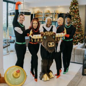 Jenni Thomasson Instagram - Horns, Hooves, Cape, Rose! It was such an incrediBULL experience getting to watch @todrick slay on #themaskedsinger all season and a nice surprise getting to add another version of Nails Hair Hips Heels to the repertoire for the Christmas special 😂! I’ll be spending this Christmas quarantining so I’m extra thankful we got to make some holiday magic while we could. I know so many are struggling right now and sick or in isolation. Sending lots of love to everyone and hoping for a healthier year ahead. #thankfultobevaxxed #letsgetboosted #wearamask ✌️